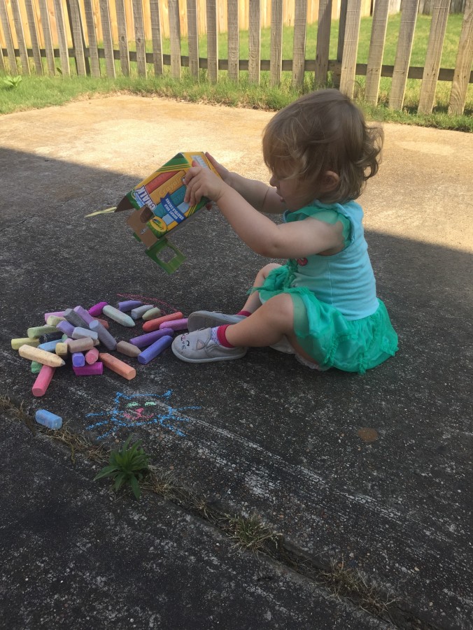 Ariel playing with chalk May 2019